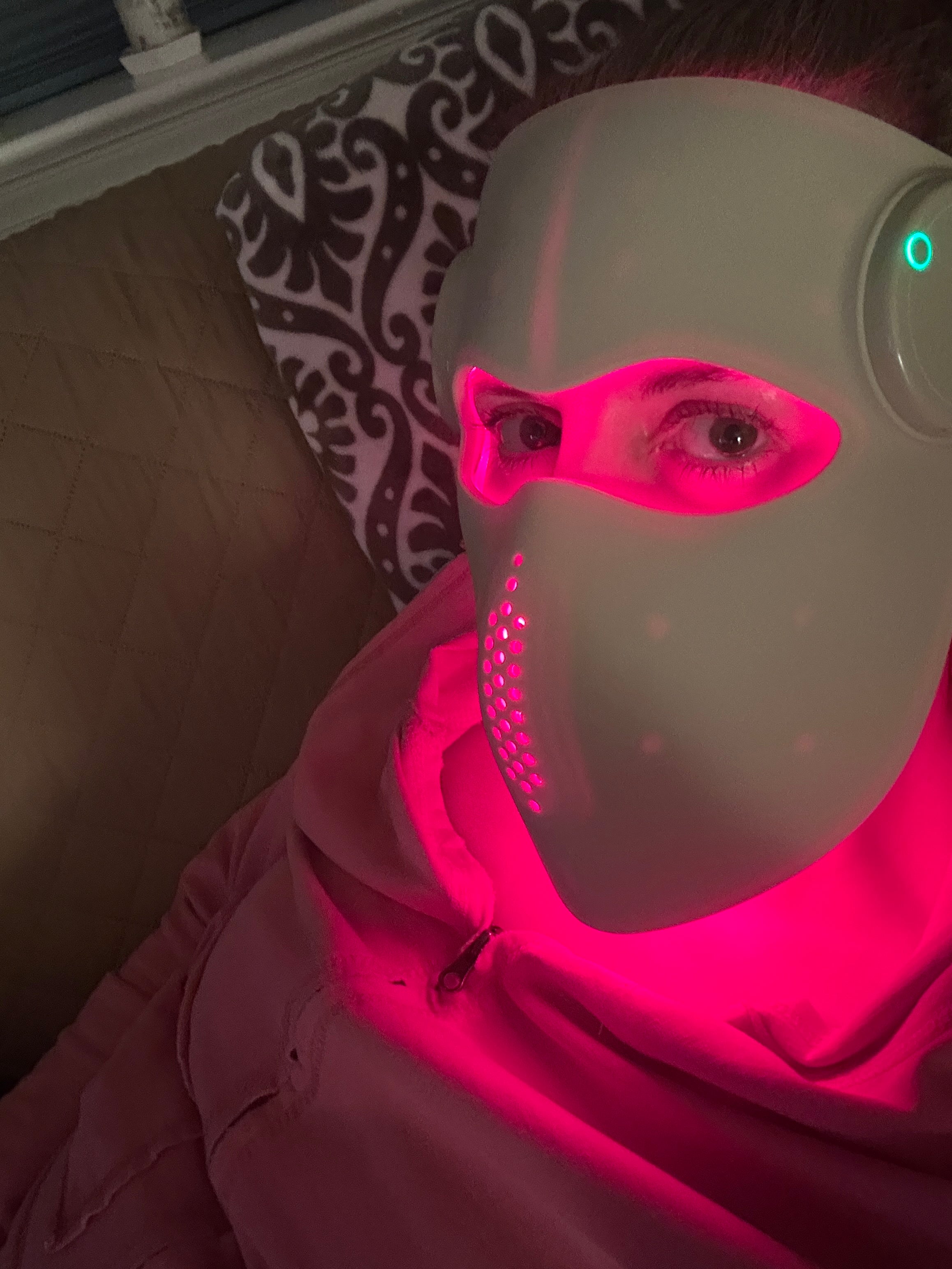 Person wearing a NuYOU360 VCSEL Laser Mask with Red Light Setting.