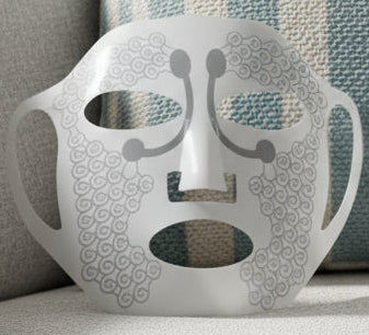 Two gray face masks with unique patterns on a white background