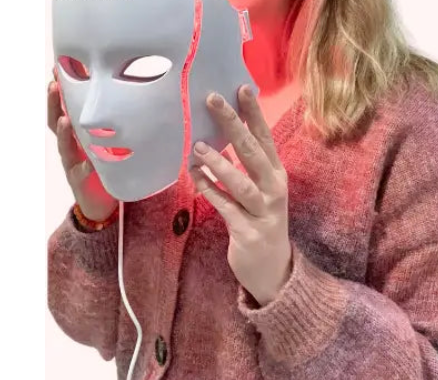 NuYOU360LED mask advertisement with images of people using the product and text about its benefits.