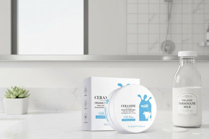 Ceramide skincare products on a bathroom counter with a plant in the background
