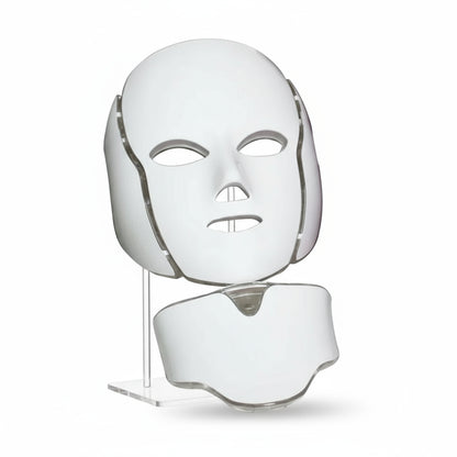 White facial mask with adjustable straps on a white background