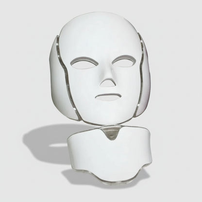 White facial mask with adjustable straps on a white background