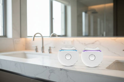 Three Hot & Cold LED Microcurrent Beauty Devices with colorful top lights 