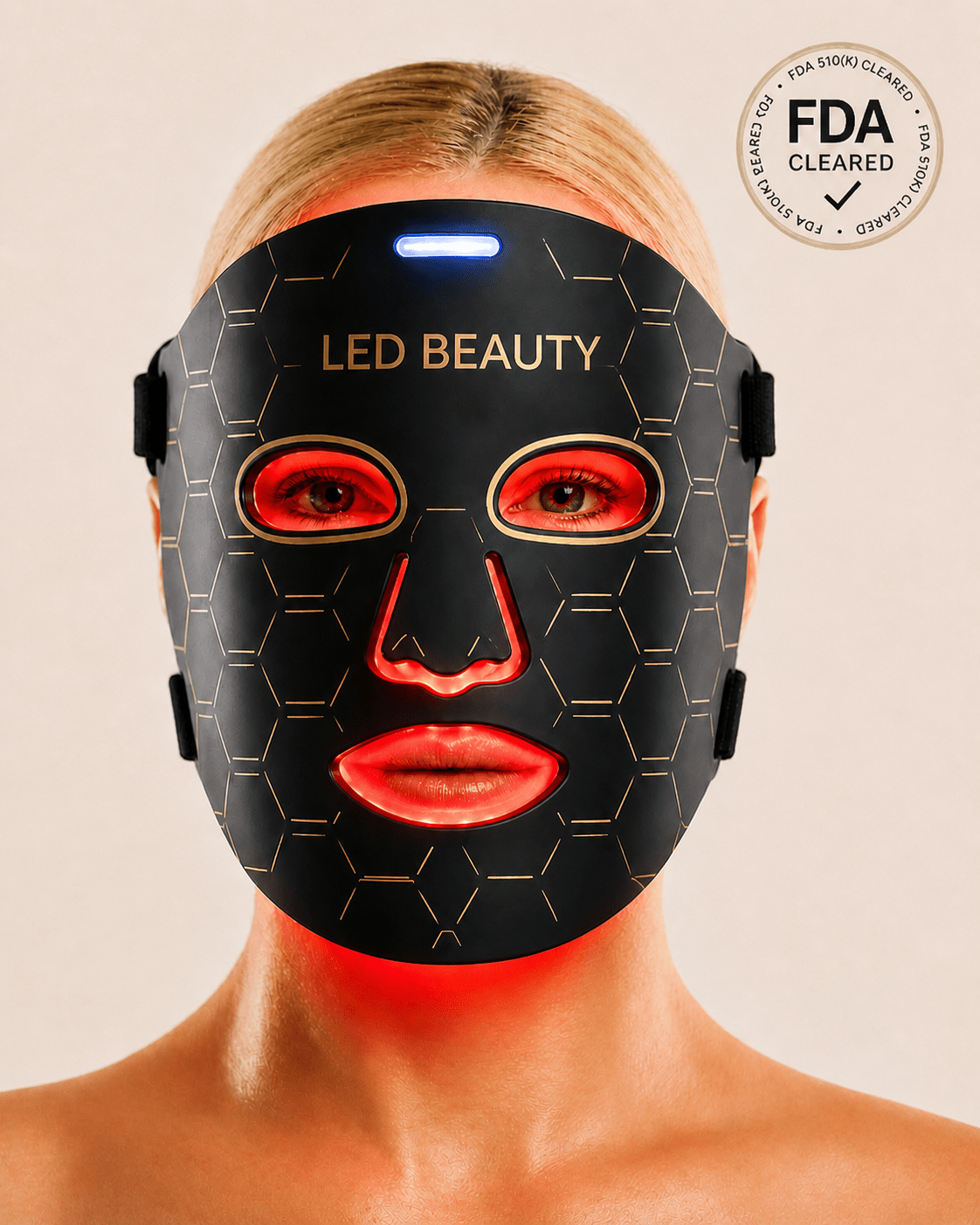 LED beauty mask with 'LED Beauty' branding and FDA clearance badge on a beige background