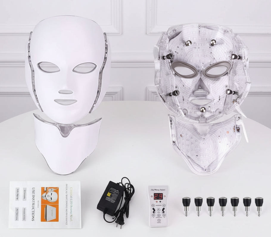 LED face and neck mask with components and accessories on a white background