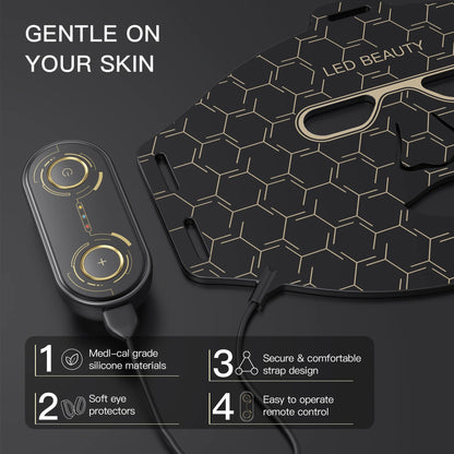 Black beauty device with hexagonal pattern and remote control on a dark background