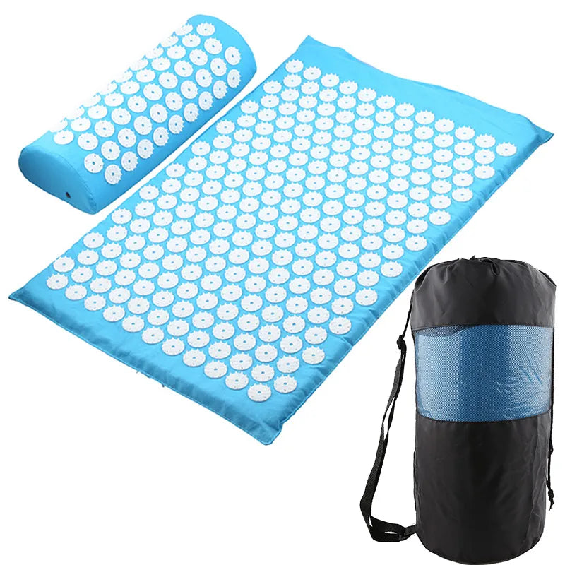 Blue acupressure mat with white nodes and carrying bag on a white background