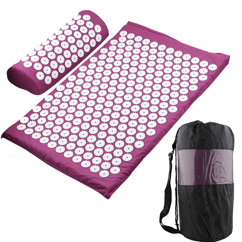 Acupressure mat with white acupressure points and a carrying bag on a white background